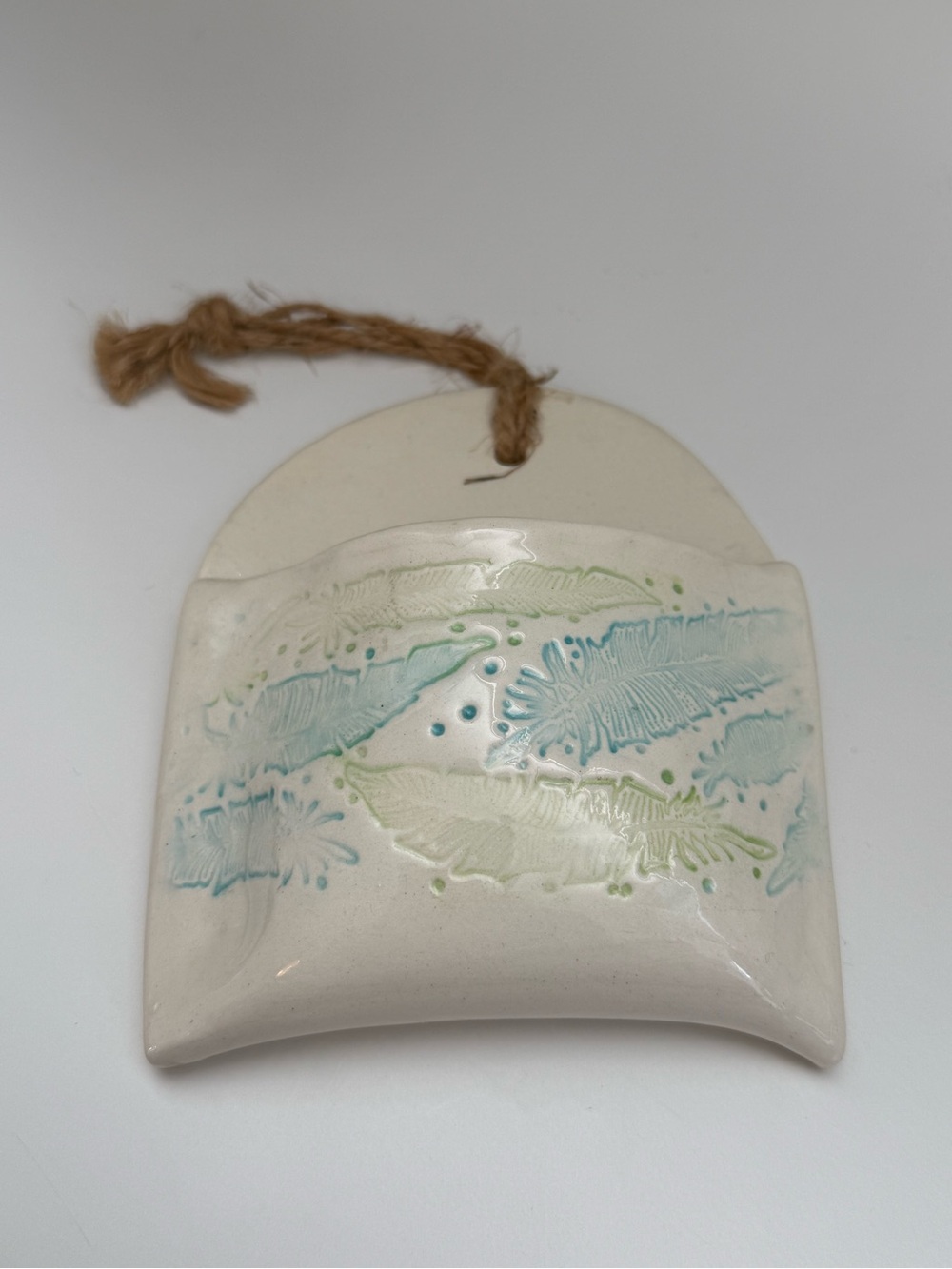 Hand Crafted Ceramic Wall Pocket in Cream with Aqua and Sage Feather Motif